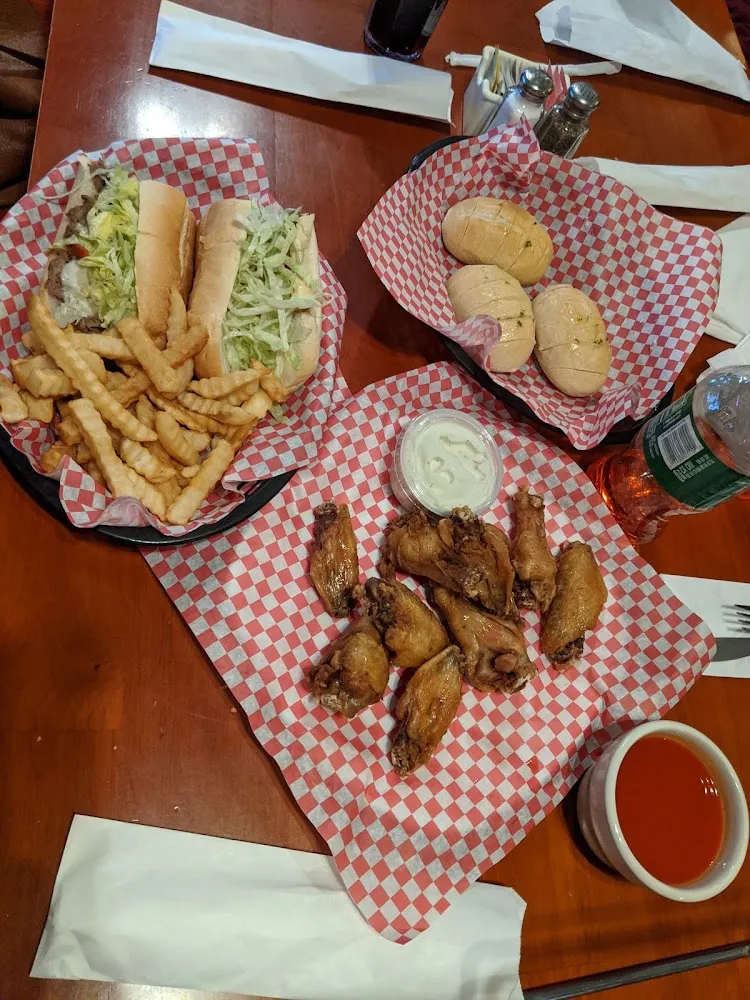 Sliced Warm Bread Philly Cheese Steak Fries Chicken Wings